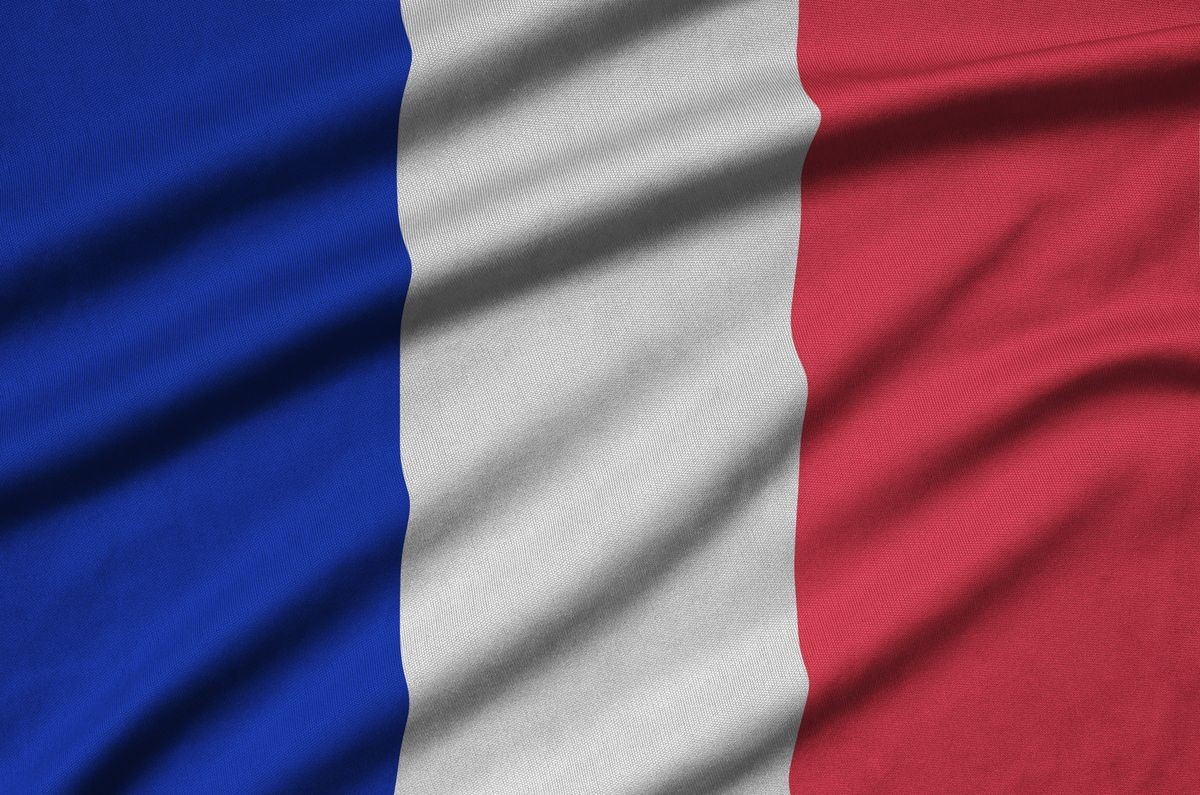 France flag  is depicted on a sports cloth fabric with many folds. Sport team banner